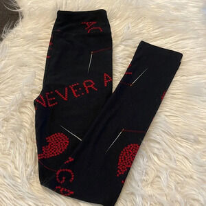 New! Girl’s Lularoe Never Again Valentine leggings L/XL